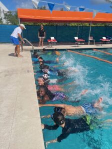 Lori Bosco and Carla Fry supervise kids at the pool