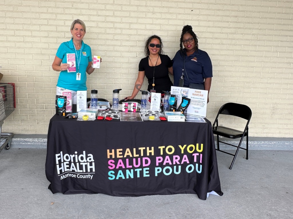 Revive Day volunteers pictured left to right: Jennifer Lefelar (DOH-Monroe), Yanilsa Urena-Fermin (DOH-Monroe), Shai Foy (Guidance Care Center) at Winn-Dixie in Big Pine Key.