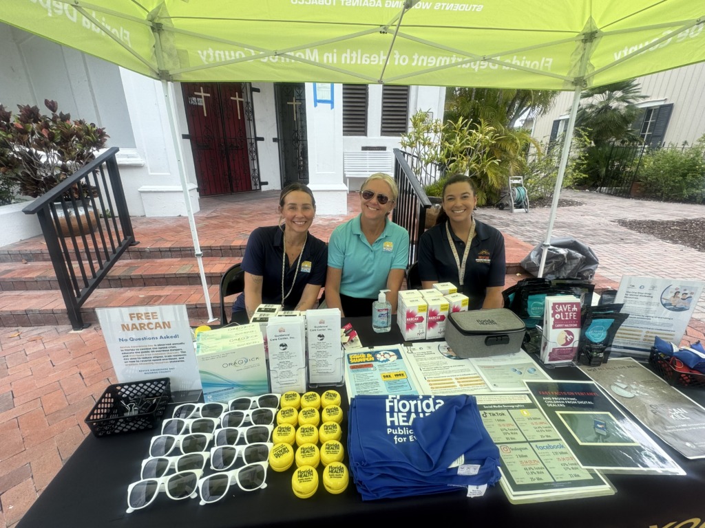 Revive Day volunteers pictured left to right: Kaitlin Bailey (DOH-Monroe), Jackie Curl (DOH-Monroe), and Bronte Walsh (Guidance Care Center) at St. Paul's Episcopal Church on Duval Street in Key West.